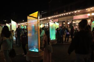 attendees interacting with prismatica, one of the installations.