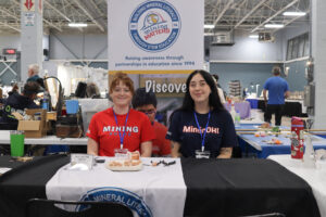Alex Stones (left) and Jordan Gush (Right) at their table representing the organization, Mining Matters.