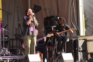 Izzy Rose singing her music live on stage at the Ottawa 200 Block Party.