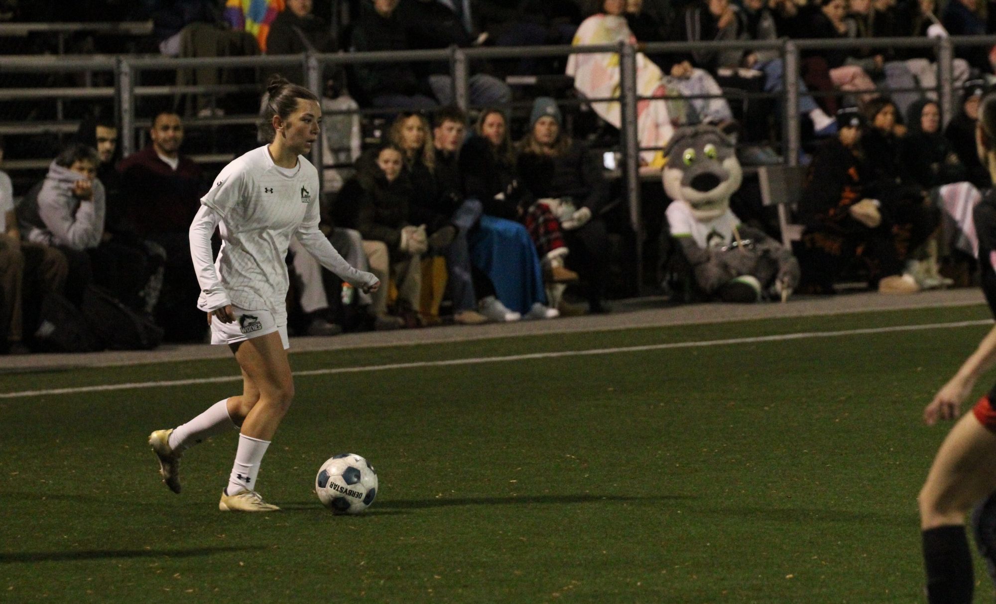 Wolves midfielder Kassandra Da Cruz carries the ball against the Fanshawe Falcons in Wednesday's playoff qualifier match.