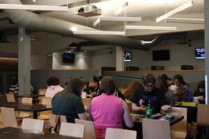 Students playing card and board games.