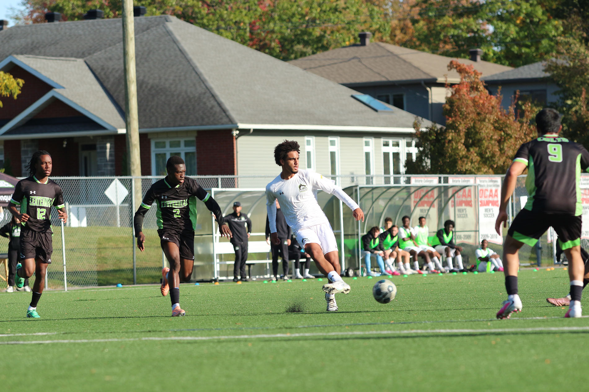 Shaundre Parkes passes the ball to a teammate.