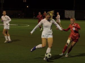 Ashley Woodcock moving the ball